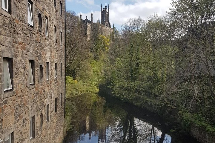 Experience the charm of Dean Village where historic architecture meets serene river views inviting you to explore hidden paths and local treasures away from the tourist buzz.